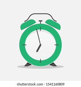 Classic alarm clock over white background