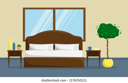Classic bedroom interior with double bed and bedside tables. 