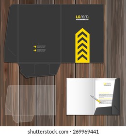 Classic black folder template design for corporate identity with central yellow arrow. Stationery set