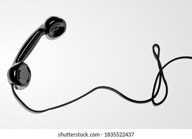 Un teléfono clásico negro con cable