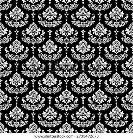 Classic black and white seamless damask pattern with elegant floral ornaments. Luxury vintage background ideal for wallpaper, textile, fabric, wrapping paper, packaging, and interior decoration.
