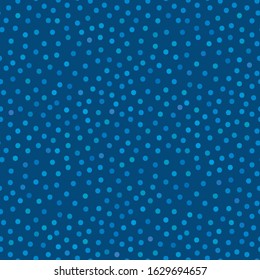 Classic blue dotted, confetti seamless pattern background.