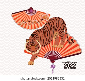 Classic Chinese new year 2022 blossom and oriental folding Paper Fan. Year of the Tiger. Happy Chinese New Year, Year of the Tiger