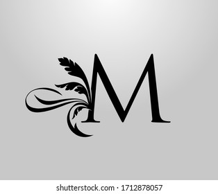 Classic Elegant letter M Floral logo. Vintage drawn emblem for book design, weeding card, brand name, business card, Restaurant, Boutique, Hotel. 