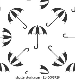 Classic elegant opened umbrella icon seamless pattern on white background. Rain protection symbol. Flat design. Vector Illustration