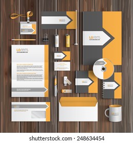 Classic gray corporate identity template design with arrow and orange element. Business stationery