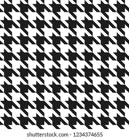 Classic houndstooth pattern in black and white repeats seamlessly.