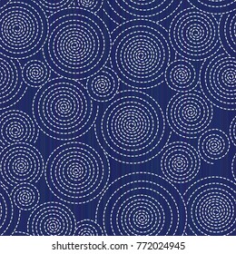 Classic japanese quilting. Sashiko. Seamless pattern. Circles and spirals. Abstract backdrop. Asian background. Needlework texture. Pattern fills. For needlework, texture or decoration.