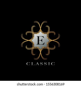 Classic  letter E logo  with golden  geometric  design concept for business luxuries, boutique, hotel, fashion.