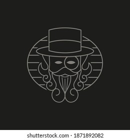 Un hombre de aspecto clásico, con sombrero y barba, con eypiece