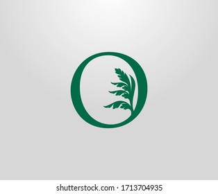 Classic O Letter Luxury Logo. Letter O With Green Floral Shape design perfect for fashion, Jewelry, Beauty Salon, Hotel Logo. Cosmetics, Spa Logo. Resort and Restaurant Logo. 