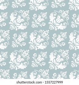 Classic seamless vector light blue and white pattern. Damask orient ornament. Classic vintage background. Orient ornament for fabric, wallpaper and packaging