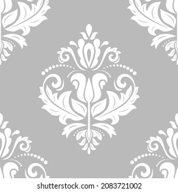 Classic seamless vector pattern. Damask orient ornament. Classic vintage light brown and white background. Ornament for fabric, wallpapers and packaging