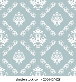 Classic seamless vector pattern. Damask orient ornament. Classic vintage blue and white background. Orient ornament for fabric, wallpapers and packaging