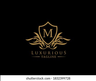 Classic Shield Logo With M Letter. Elegant Shield badge With Floral Shape perfect for fashion, Boutique, Jewelry, Hotel, Restaurant.