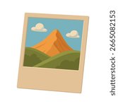 A classic snapshot of a mountain scene featuring rolling hills, blue sky, and clouds. Nostalgic vibe.