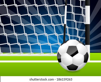 Classic soccer ball near gate with dark night background