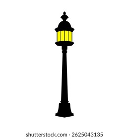 Classic street lamp with black pole and yellow light, ideal for vintage themes.garden lamp.