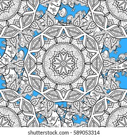 Classic vector white seamless pattern. Traditional orient ornament. Classic vintage background. Seamless pattern on blue background with white elements.