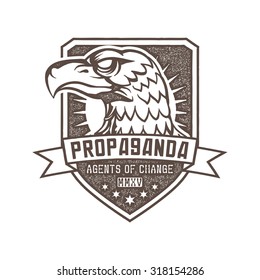 classic vintage propaganda eagle badge - agents of change 