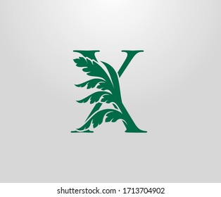 Classic X Letter Luxury Logo. Letter X With Green Floral Shape design perfect for fashion, Jewelry, Beauty Salon, Hotel Logo. Cosmetics, Spa Logo. Resort and Restaurant Logo. 