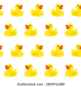 Classic yellow rubber duck with red beak isolated on white background. Seamless pattern. Toy animal. Design element for packaging, wrapping, textile print, accessories. Stock vector illustration