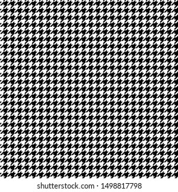Classical black and white hounds tooth prints. Traditional seamless pattern with small checkers. Winter textile collection.