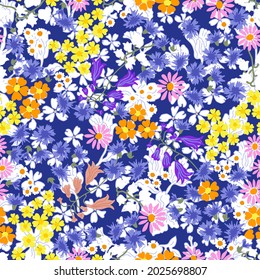 Classical ditsy floral print on blue background. Summer textile collection.