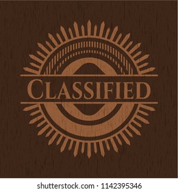 Classified badge with wooden background