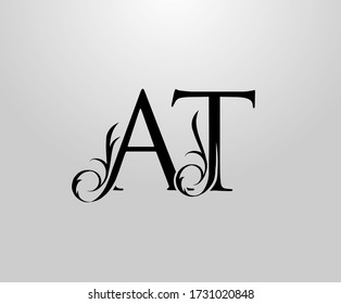 Classy A, T and AT Letter logo. Graceful Floral Alphabet Mark for book design, letter stamp, weeding card, brand name, Restaurant, Boutique, Hotel. 