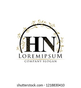 Classy Floral Gold HN Letter Logo