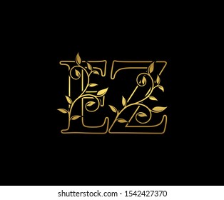 Classy  letter E , Z and EZ  Vintage Gold Floral Logo Icon, overlapping monogram logo, elegant luxury GOLD color on black background. Classy Letter Logo Icon.