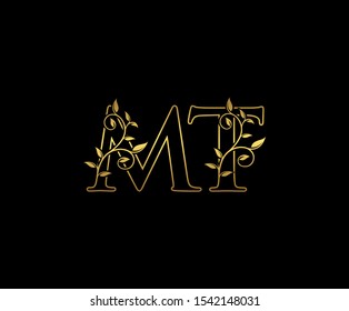 Classy  letter M , T and MT  Vintage decorative ornament emblem badge, overlapping monogram logo, elegant luxury gold color on black background