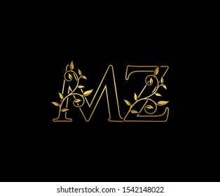 Classy  letter M , Z and MZ  Vintage decorative ornament emblem badge, overlapping monogram logo, elegant luxury gold color on black background