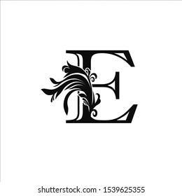 Classy Monogram Luxury Initial Letter E logo design concept on black color with floral shape for luxuries business, fashion, hotel, royal and more brands.