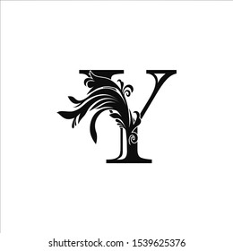 Classy Monogram Luxury Initial Letter Y logo design concept on black color with floral shape for luxuries business, fashion, hotel, royal and more brands.