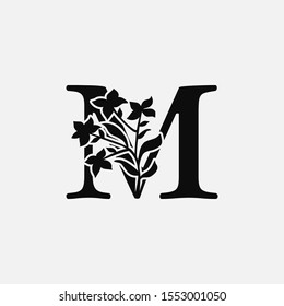 Classy Nature Initial letter M vintage Logo Icon. Design Concept Monocrome leaves Logo Icon black color  recomended for boutique,restaurant, wedding service, hotel or business identity.