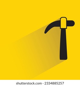 claw hammer with shadow on yellow background