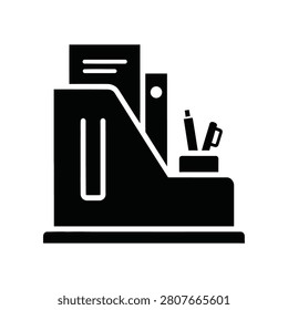 A clean black desk organizer holding documents and writing tools. Ideal for office organization and productivity themes.