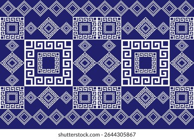 A clean and bold pixel-style pattern featuring geometric diamond shapes and Greek-inspired motifs in white over a rich blue background. This seamless tribal textile design blends modern minimalism wit