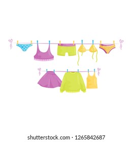 Clean clothes hanging on ropes. Female garment. Laundry theme. Flat vector design