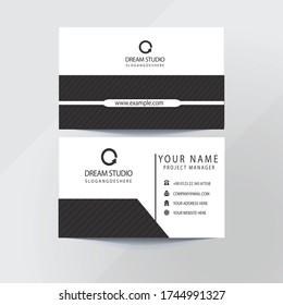 clean dark business card Modern business card template design. With inspiration from the abstract. Contact card for company. Two sided black and white on the gray background. Vector illustration.