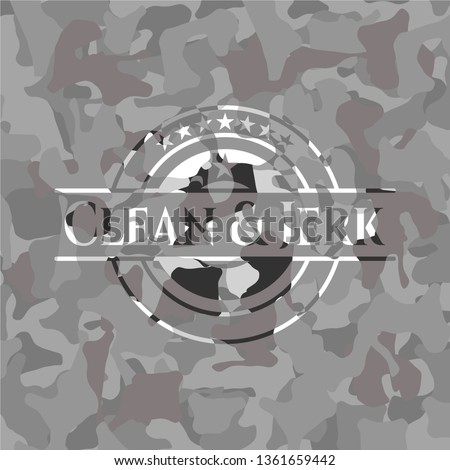 Clean & Jerk written on a grey camouflage texture