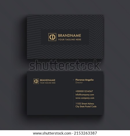 Clean and Minimal Dark Grey Business Card Template premium vector
