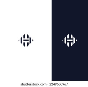 Clean, minimalist monogram logo design featuring a stylized H within a geometric hexagon.  Perfect for modern branding.  The logo is shown on both white and dark backgrounds.