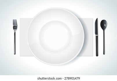 Clean plate with knife and fork on white background