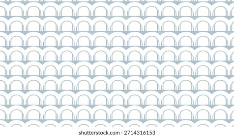 Clean and simple seamless geometric pattern has repeating light blue arches, creating a calm and minimalist scale-like texture.