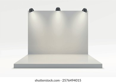 A clean white exhibition backdrop illuminated by three black spotlights on a raised platform