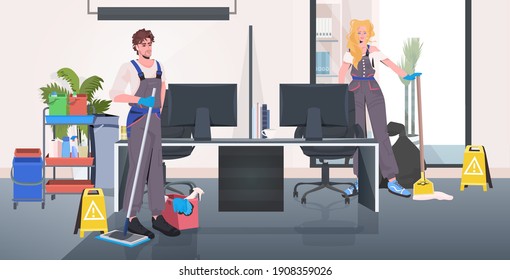 cleaners in uniform cleaning and disinfecting floor to prevent coronavirus pandemic modern office interior horizontal full length vector illustration