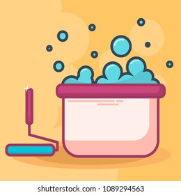 cleaning and laundry concept. bucket with soap water with bubbles and clean towels